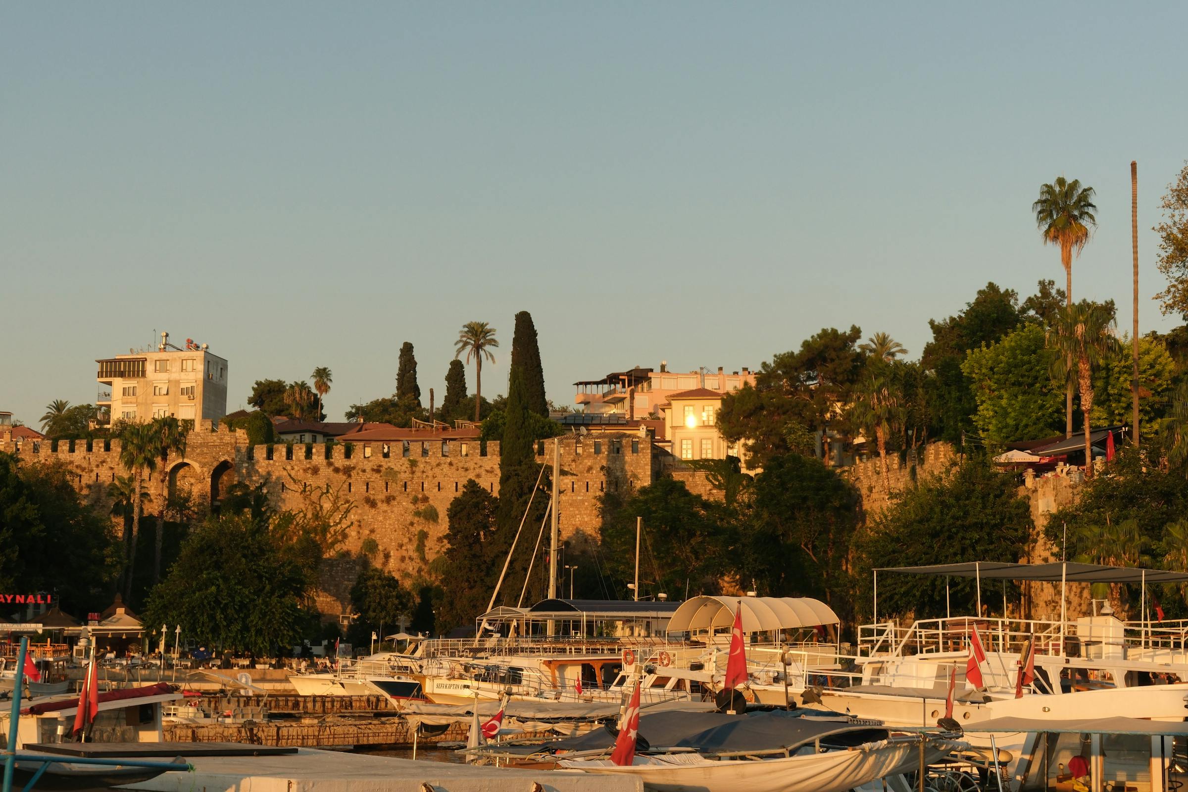 Antalya old harbour with cliffs at golden hour