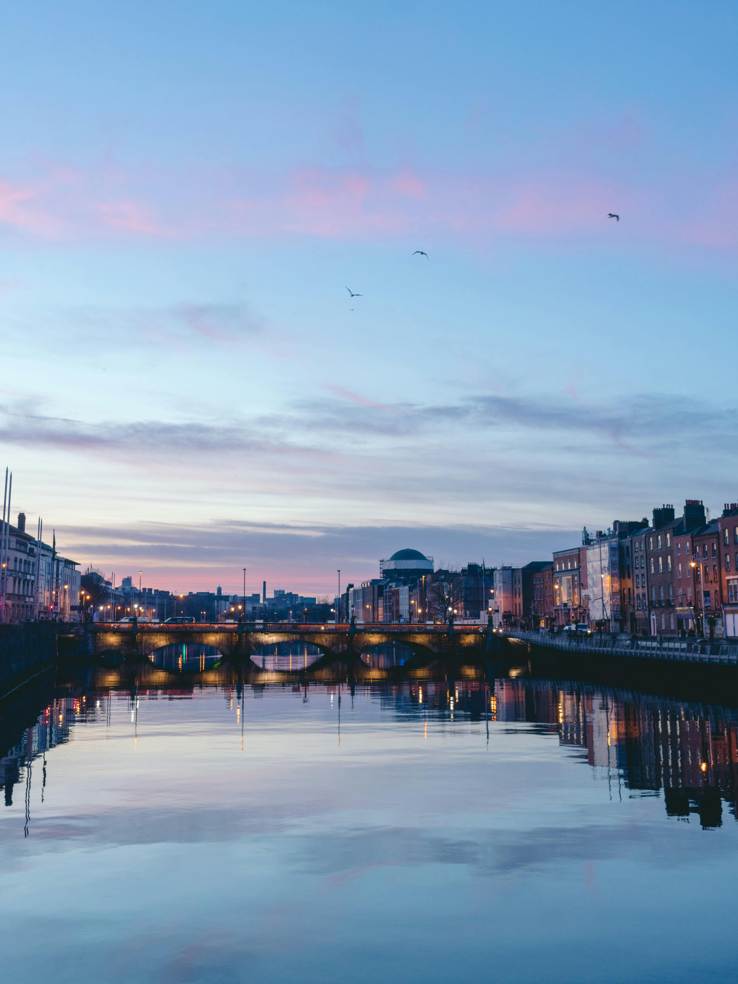 Dublin Liffey river at golden hour with Georgian facades
