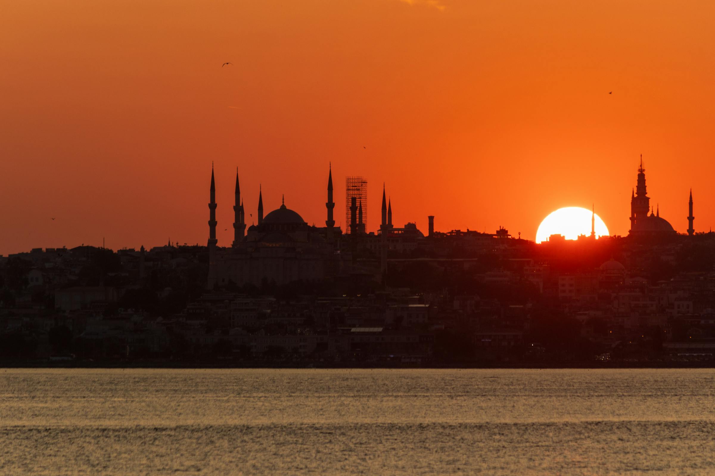 Istanbul Bosphorus with mosques silhouetted at dusk